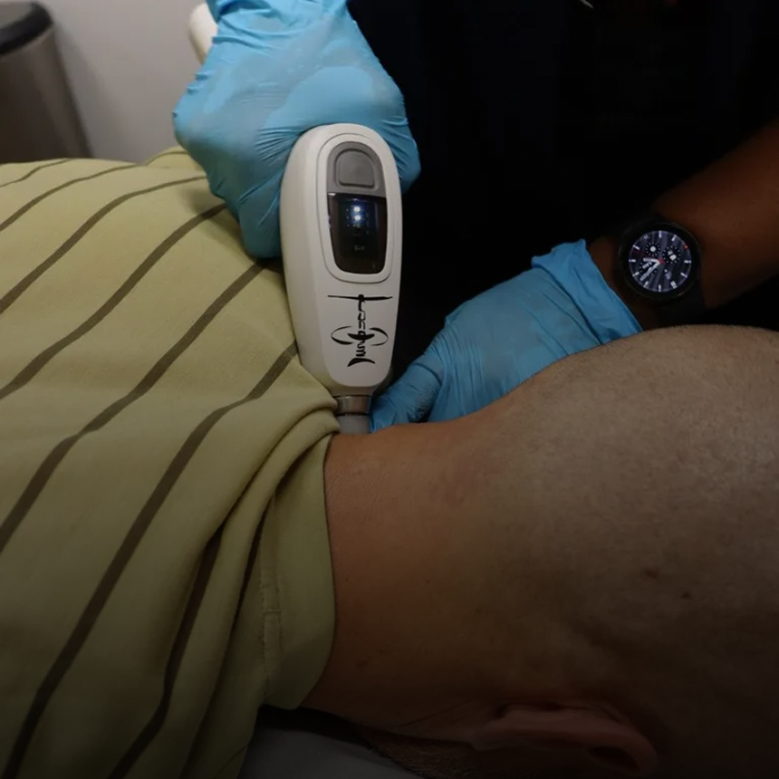 Healthcare professional using diagnostic tool